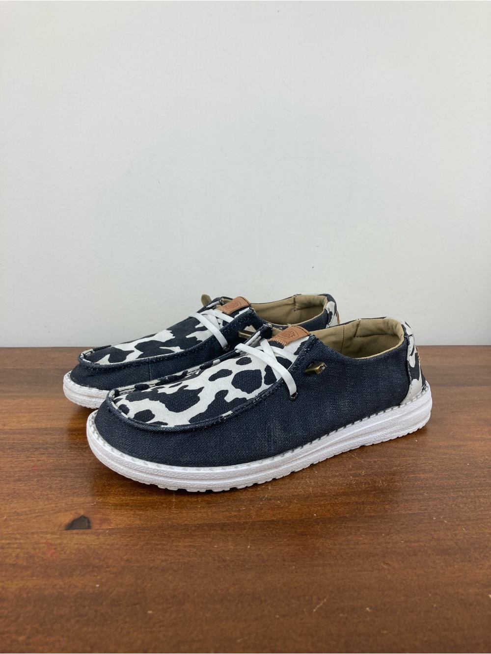 Hey Dude Wendy Animal Black Cow Print Slip-On Shoes 41037-0HO Women's Size 6.